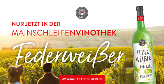 Federweißer in der MainschleifenVinothek – Weinberge im Hintergrund